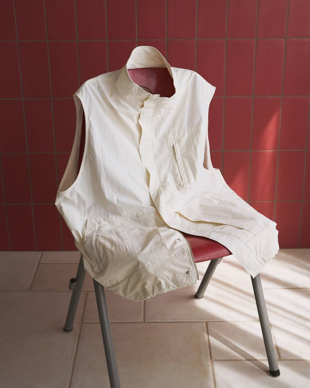 Standcollar Pocket Vest Standcollar Pocket Vest,スタンドカラー ポケット ベスト,62610103,ナイロンベスト,オーバーサイズ,羽織,ベスト,アウター,ジャケット,ànuke,アンヌーク,lifes,ライフズ,26ss